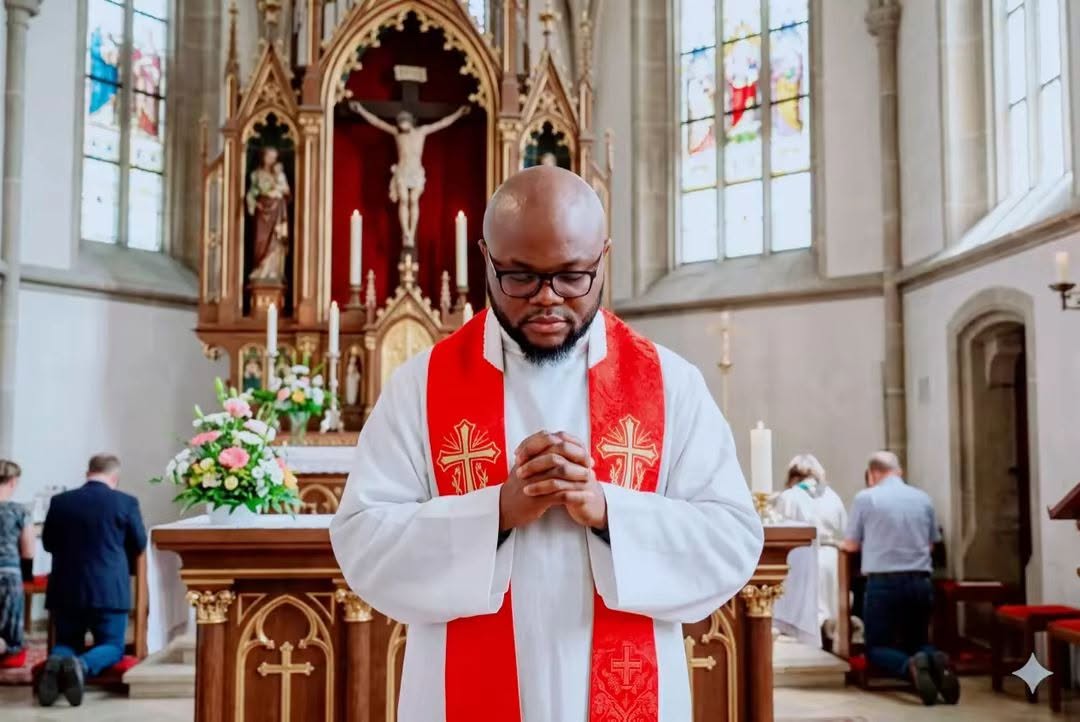 Fr. Innocent Maduwuba praying at the altar during Mass